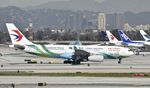 B-5902 @ KLAX - Taxiing to gate at LAX - by Todd Royer