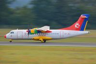 OY-JRJ @ LOWG - Colorful ATR-42 taking of at LOWG, blurry background - by Paul H