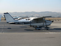 N7712U @ KLVK - 1964 Cessna 172E on visitor's ramp @ Livermore, CA - by Steve Nation