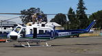 N340WN @ OLM - Bell UH-1H  of the USFS Forestry Service at Olympia Airport July 26, 2017, undergoing maintenance on the ramp. - by RAFOHunter
