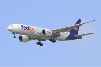 N856FD @ LFPG - Boeing 777-FS2, Short approach rwy 27R, Paris-Roissy Charles De Gaulle airport (LFPG-CDG) - by Yves-Q