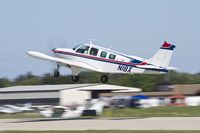 N18X @ KOSH - Beech A36 taking off from KOSH - by Eric Olsen