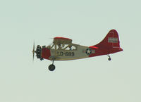 N52777 @ OSH - N52777 L-5 arriving at Oshkosh - by Pete Hughes