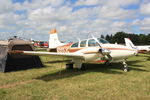 N333JG @ OSH - 1964 Beech D95A, c/n: TD-580 - by Timothy Aanerud