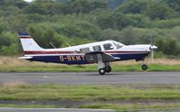 G-BKMT @ EGFH - Resident Saratoga SPII departing Runway 28 at Swansea Airport. - by Roger Winser