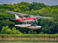 N9211X @ 8Y4 - About to land during the Minnesota Seaplane Pilots Association pig roast - by Greg Drawbaugh