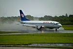 EW-404PA @ EGCC - just landed on a very wet runway 23R @ EGCC - by andysantini
