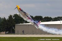 N669RB @ KOSH - Red Bull Air Race pilot, Kirby Chambliss take off, N669RB - by Dariusz Jezewski www.FotoDj.com