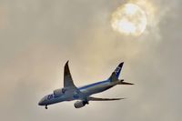 JA804A @ RJTT - Inside the clouds, the Sun Behind - by JPC