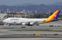 DQ-FJL @ KLAX - Being towed to a parking lot to free up a gate at LAX. - by Dave Turpie