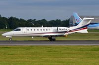 M-ABJA @ EGCC - One of 3 Ryanair learjet 45's. - by FerryPNL