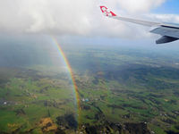 9M-XXP @ NZAA - Rainbow on approach to Auckland (OOL-AKL) - by Micha Lueck