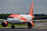G-EZFL @ EGCC - Easyjet A319 taxying to its stand. - by FerryPNL