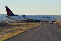 N3733Z @ KBOI - Crossing between the runways on Golf. - by Gerald Howard