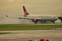 G-VWAG @ EGCC - just landed on a very wet runway 23R - by andysantini