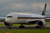 9V-SMI @ EGCC - taxing in to its gate/stand. - by andysantini