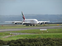 A6-EEK @ NZAA - long range shot -just landed - by magnaman