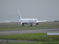 TF-FIW @ NZAA - turning off runway - by magnaman