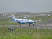 ZK-MFT @ NZAA - long range shot from car park - by magnaman