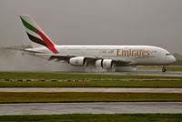 A6-EEB @ EGCC - landed on a wet runway - by andysantini