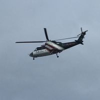 ZK-IKM - landing at AKL hospital helipad - from our hospital ward window - by magnaman