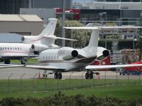 N829JV @ NZAA - long range from look out car park - by magnaman