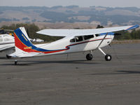N422RT @ O69 - Colorful Montana based 1977 Cessna 180K @ Petaluma Municipal Airport, CA - by Steve Nation