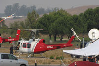 N216GH @ O69 - Rotorcraft Support (Van Nuys, CA) 1969 Bell 205A-1 (UH-1H) water dropping helicopter readies for take-off @ Petaluma Municipal Airport, CA temporary home base in support of efforts to control devastating Oct 2017 Northern California wildfires - by Steve Nation