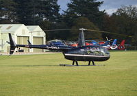 G-OHLI @ EGLD - Robinson R44 Clipper II at Denham. - by moxy