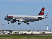 HB-IOO @ LPPT - LX2084 from Zurich (ZRH) landing runway 03 - by JC Ravon - FRENCHSKY