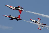 71-3072 @ LMML - NF-5s of the Turkish Stars Aerobatic Team performing over Malta - by Raymond Zammit