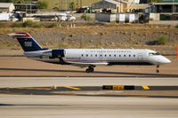 N468CA @ KPHX - It's a bit of an illusion.  Aircraft appears to be taxiing, but is actually still airborne. - by Dave Turpie