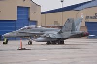 188918 @ KBOI - Blew left main tire on landing. Dolly placed under gear and tugged to Idaho ANG ramp for repairs. 410 Squadron, Cold lake, Alberta, Canada. - by Gerald Howard