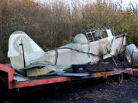 BAPC395 @ EGTB - Pilatus P-2/05 replica now in yard next to Parkhouse Aviation, Wycombe Air Park. - by moxy