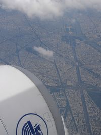 F-GZCO @ LFPG - overflying Paris Champs Elysées and Arc de Triomphe after take off destination Le Cairo airport - by JC Ravon - FRENCHSKY