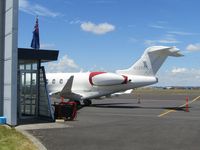 N1350S @ NZAA - At AKL -shame partly hidden behind executive terminal - by magnaman