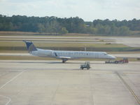 N16170 @ IAH - ERJ-145XR on tow - by Christian Maurer