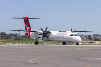 VH-QOA @ YSWG - QantasLink (VH-QOA) Bombardier DHC-8-402Q taxiing at Wagga Wagga Airport. - by YSWG-photography