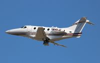 N146JE @ KISM - Hawker Beechcraft 390