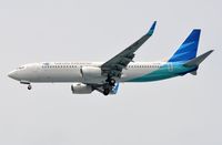 PK-GNF @ WIII - Garuda B738 landing - by FerryPNL
