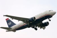 N746UW @ KCLT - US Airways A319 departing a grey CLT - by FerryPNL