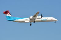 LX-LGH @ EDDF - Luxair DHC8 landing - by FerryPNL