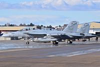 168774 @ KBOI - Two EA-18Gs from VAQ-131 “Lancers”, CVN-77, USS George H.W. Bush parked on the south GA ramp for a fuel stop. - by Gerald Howard