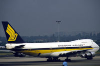 9V-SQK @ EHAM - Singapore Airlines Boeing 747-212B taxiing at Schiphol airport, the Netherlands, 1983 - by Van Propeller