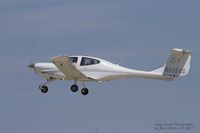 N655DS @ KOSH - Diamond DA-40 departing Airventure - by Eric Olsen