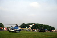 PH-RPS @ EHDL - Dutch National Police Bo 105C helicopter at Deelen Air Base Open Day 1983. German Army Bo 105P next to it. - by Van Propeller