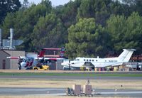 N461DF @ KRDD - Ar Redding,CA USFS/USDA Air Tanker Base Beech C-12 being moved over towards the ramp for the daily flights during fire season. - by Tom Vance