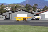 N6900H @ SZP - 1946 Piper J3C-65 Cub, Lycoming O-290 135 Hp big upgrade by STC, taxi - by Doug Robertson