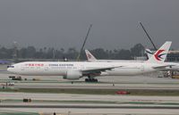 B-2022 @ KLAX - Boeing 777-39P/ER - by Mark Pasqualino