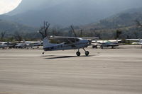 N185GE @ SZP - 1976 Cessna A185F SKYWAGON, Continental IO-520 285 Hp, landing roll Rwy 22 - by Doug Robertson